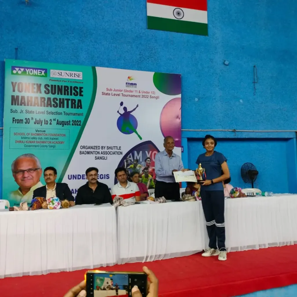 Badminton player training in arena